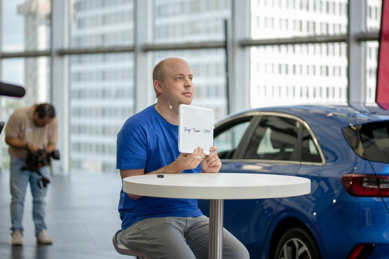 Andr&eacute; ist der gro&szlig;e Kia-Fan in der Runde