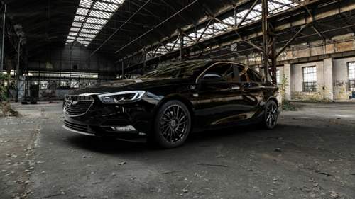 Keskin-kt17-matt-black-painted-felge-mit-reifen-schwarz-in-19zoll-winterfelge-alufelge-auf-schwarzem-opel-insignia-ii-grand-sport-typ-z-b-mit-15mm-tieferlegung-industriehalle-1-camera-000-1920