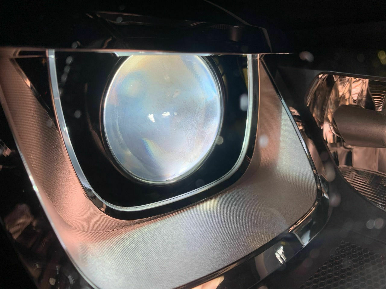 Xenon Linse beschlagen, verschmutzt, Kreis auf der Linse