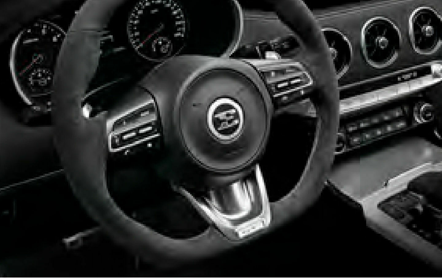 KIA STINGER FACELIFT unverstellt von hinten.