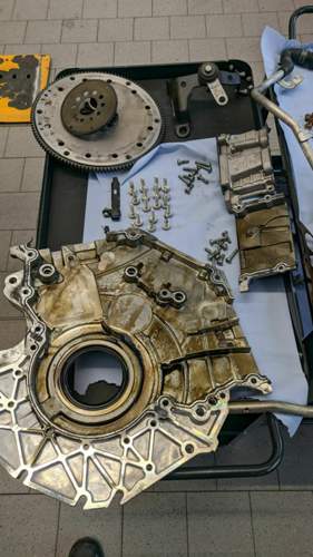 Kettendeckel und Mitnehmerscheibe