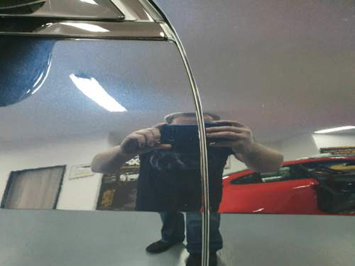 Links Tuer nicht foliert, rechts Kotfluegel foliert.jpg