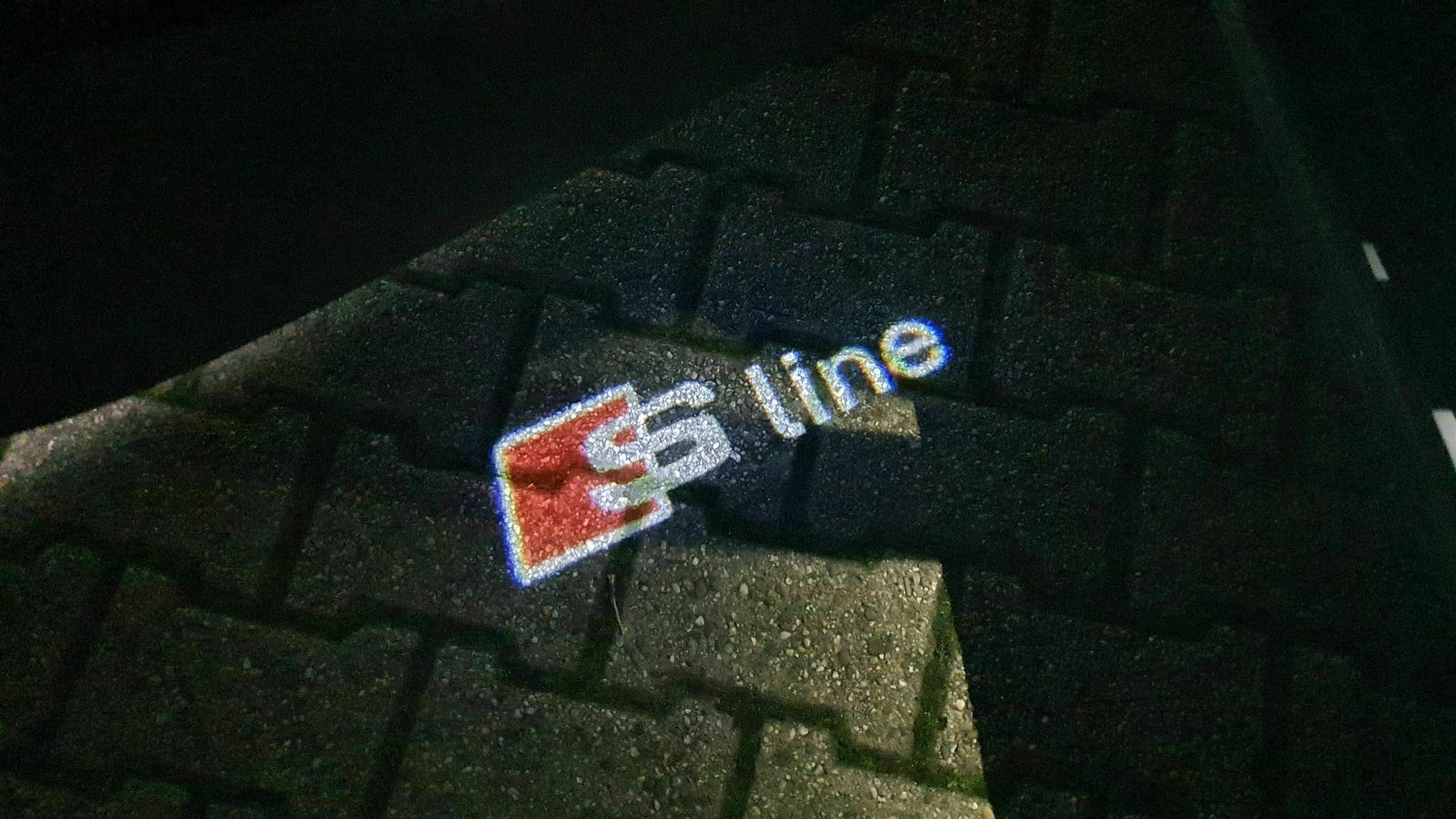 Bodenprojektion Audi Logo