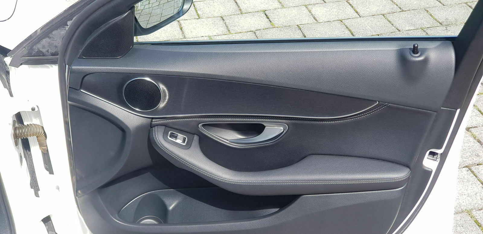 Folierung der Mittelkonsole (von Klavierlackoptik zu Carbon)