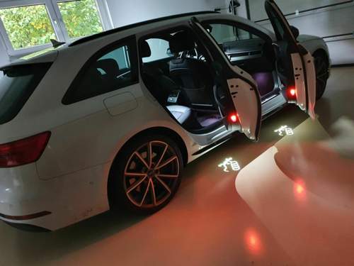 Bodenprojektion Audilogo mit Gecko