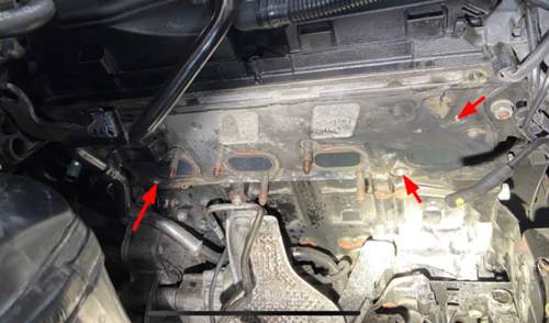 Abgerissene Stehbolzen im Motorblock.jpg