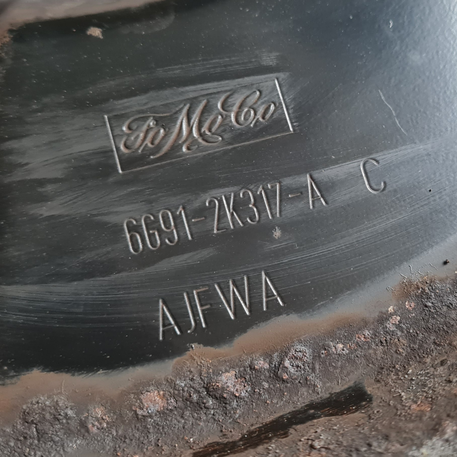 FoMoCo Emblem mit Teilenummer