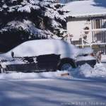 Parked-car-with-snow-l