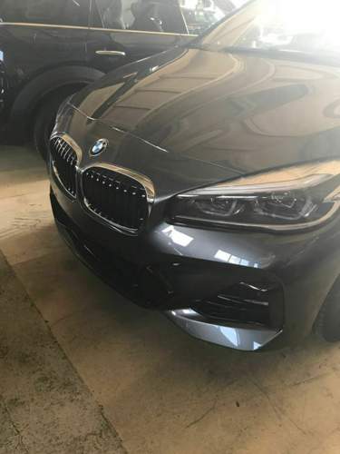 225i