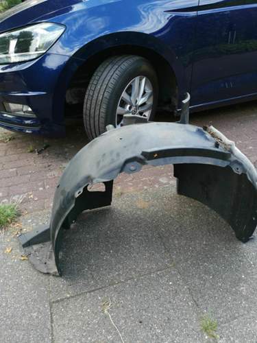 Radhausverkleidung. Fahrerseite, Toran
