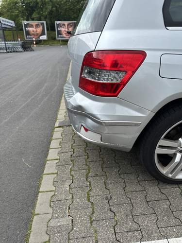 GLK Vormopf hintere Stossstange seitlich