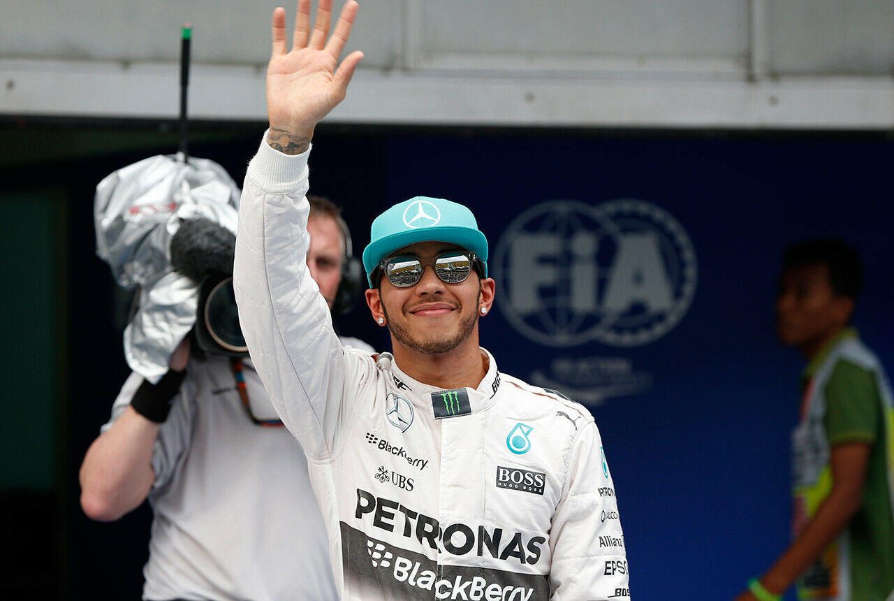Strahlender Pole-Setter im Regen von Sepang: Lewis Hamilton