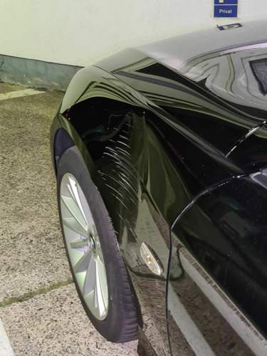BMW Kotfluegel links E91.jpg