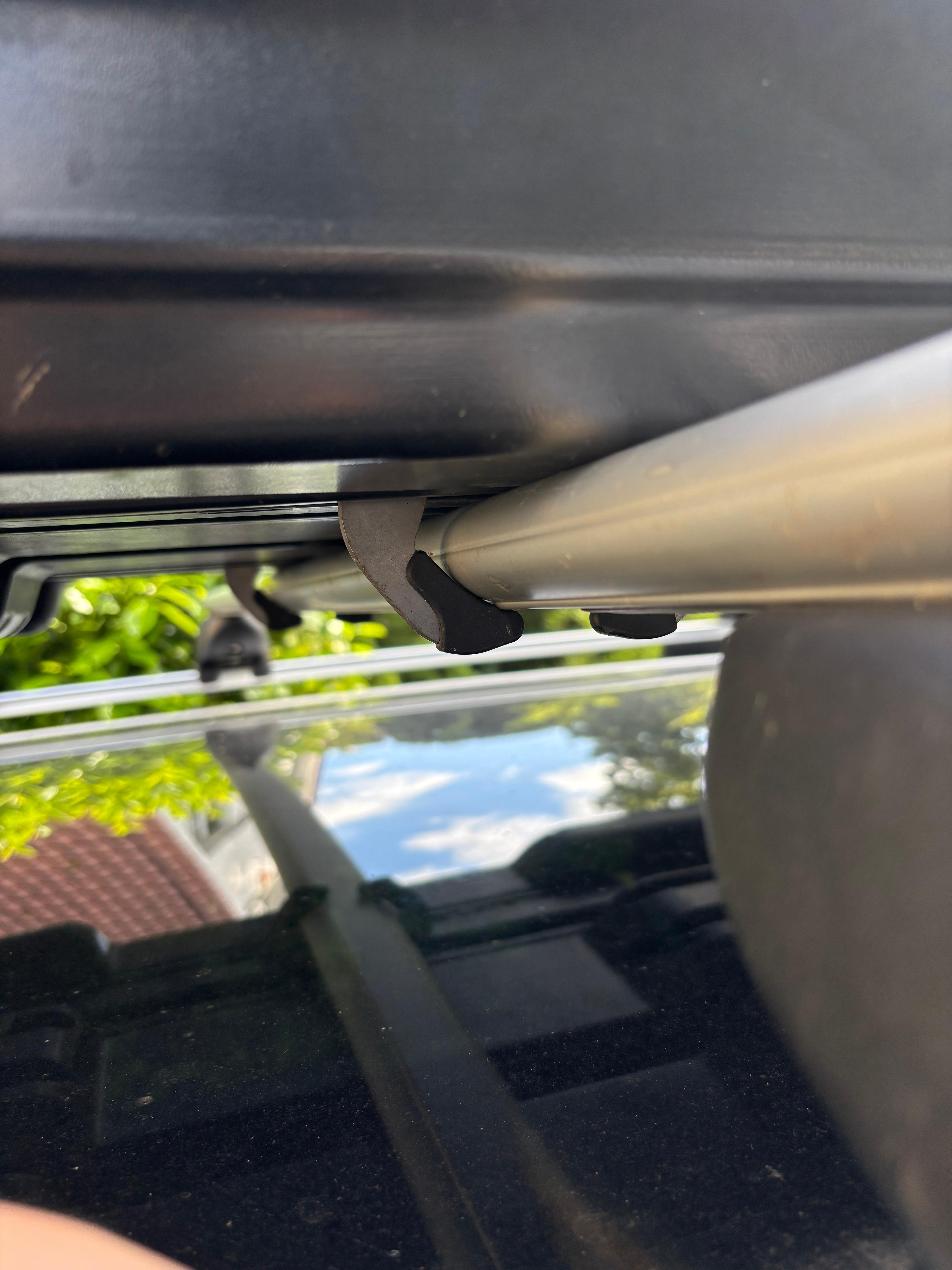 Passt das Power Click System von Thule mit dem originalen Dachträger?