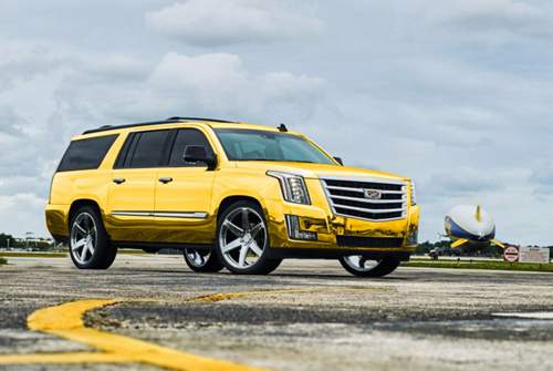 "Stilles Vorbild" des Bentayga und Liebling von Rapstars und extrovertierten Fußballprofis: Ein vergoldeter Cadillac Escalade
