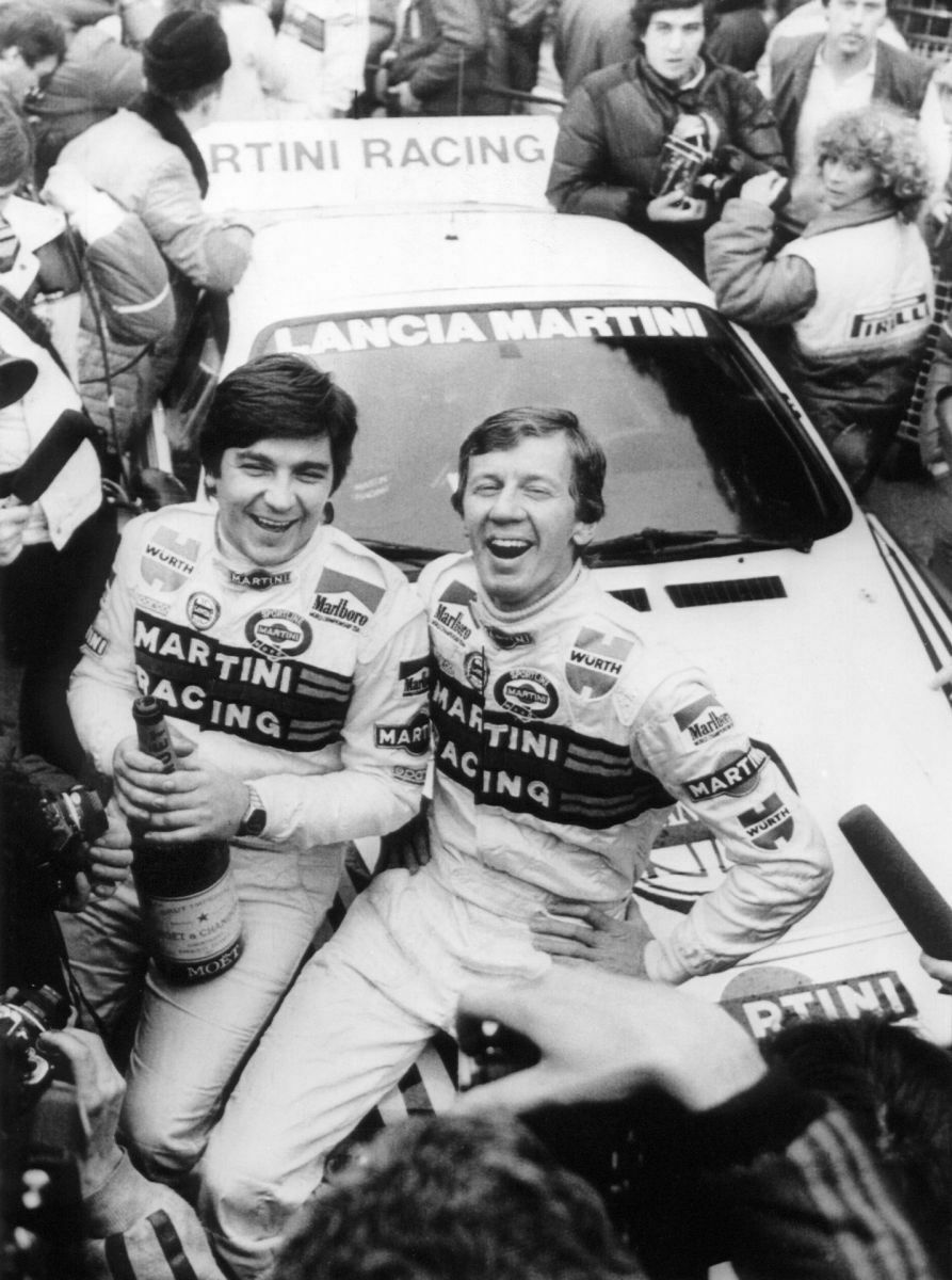 Walter Röhrl und Christian Geistdörfer auf dem Rallye-Lancia nach dem Sieg bei der Rallye Monte Carlo (1983)