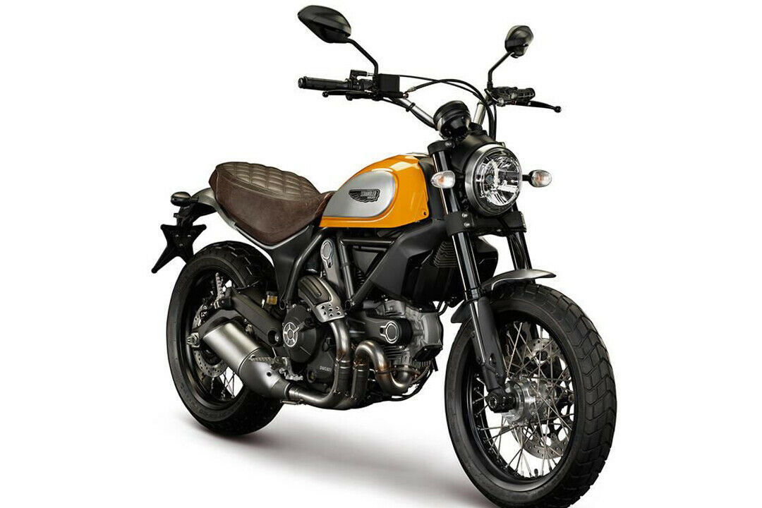Die Ducati Scrambler Classic kommt in Orange mit braunem Sitz