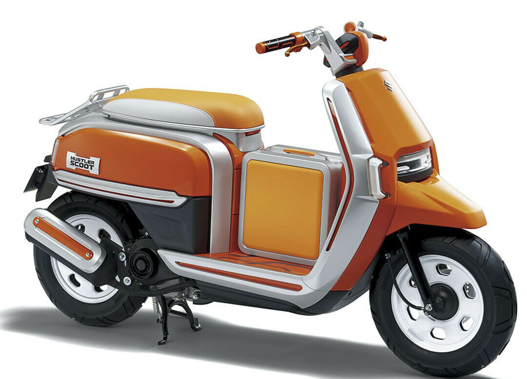 Suzuki Hustler Scoot: Das Besondere an dem 50-Kubik-Roller ist eine zusätzliche Gepäckbox mit Durchlademöglichkeit